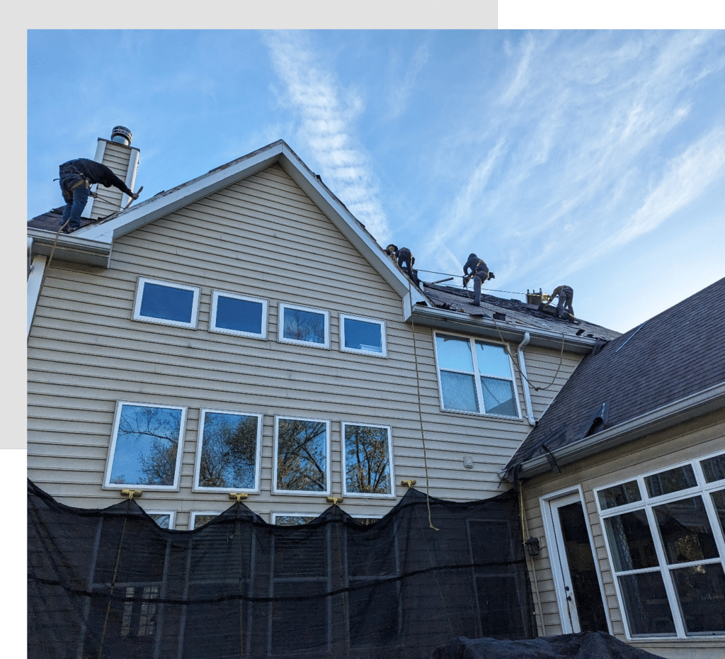 Roofers Installing a New Roof on a Home