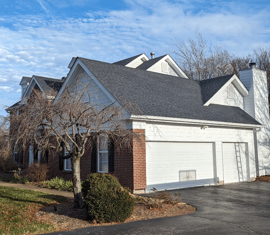White and Brick Residential Home and Roof
